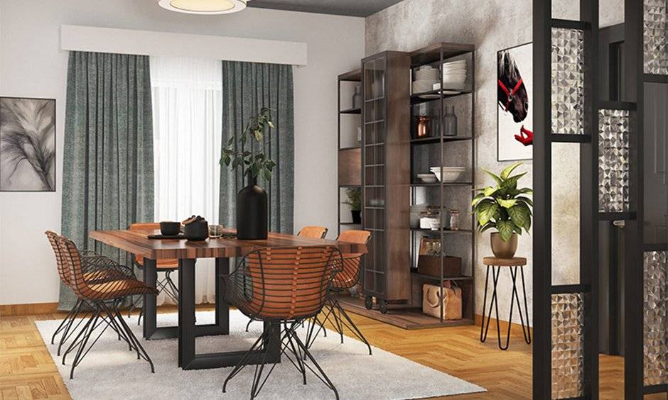 Ruang Makan dengan Desain Industrial dan Furniture Besi